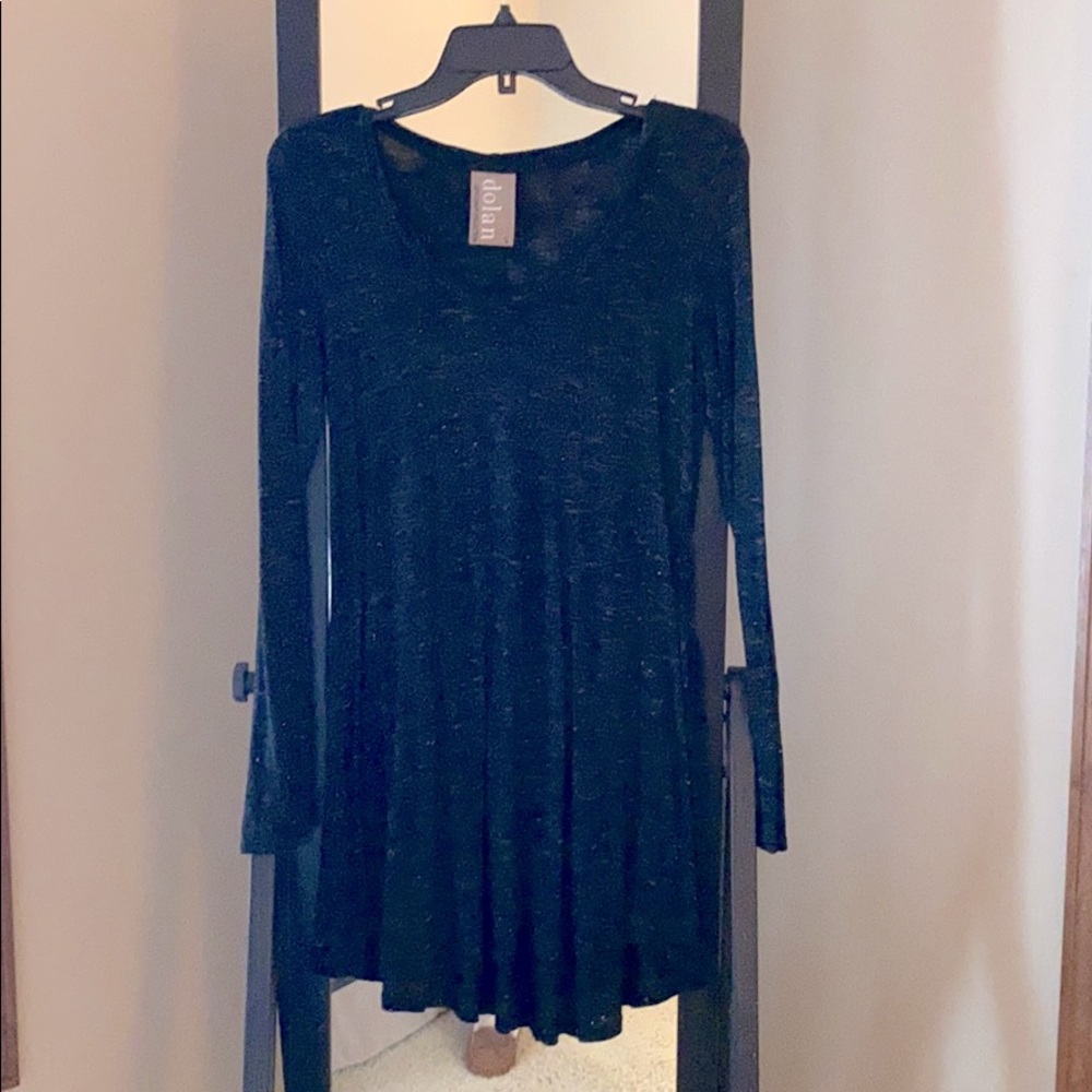 Long sleeve swing top with ruffles on the bottom